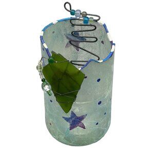 homemade candle holder decoupaged outside blue with stars added green glass READ